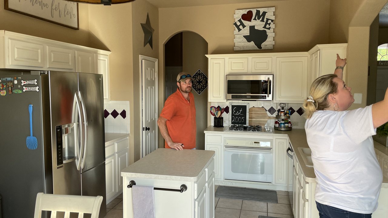 Dated kitchen with older finishes before remodel