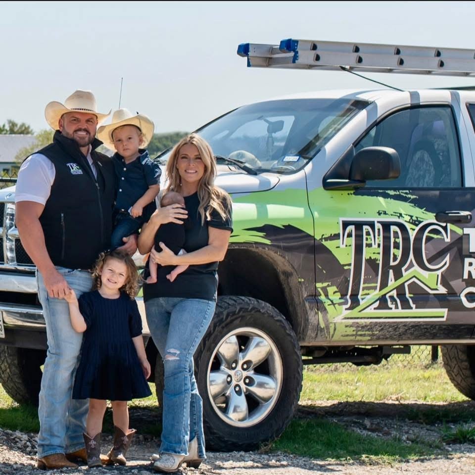 Josh Taylor, founder and owner of Texas Roofing & Construction, with his family and the TRC truck